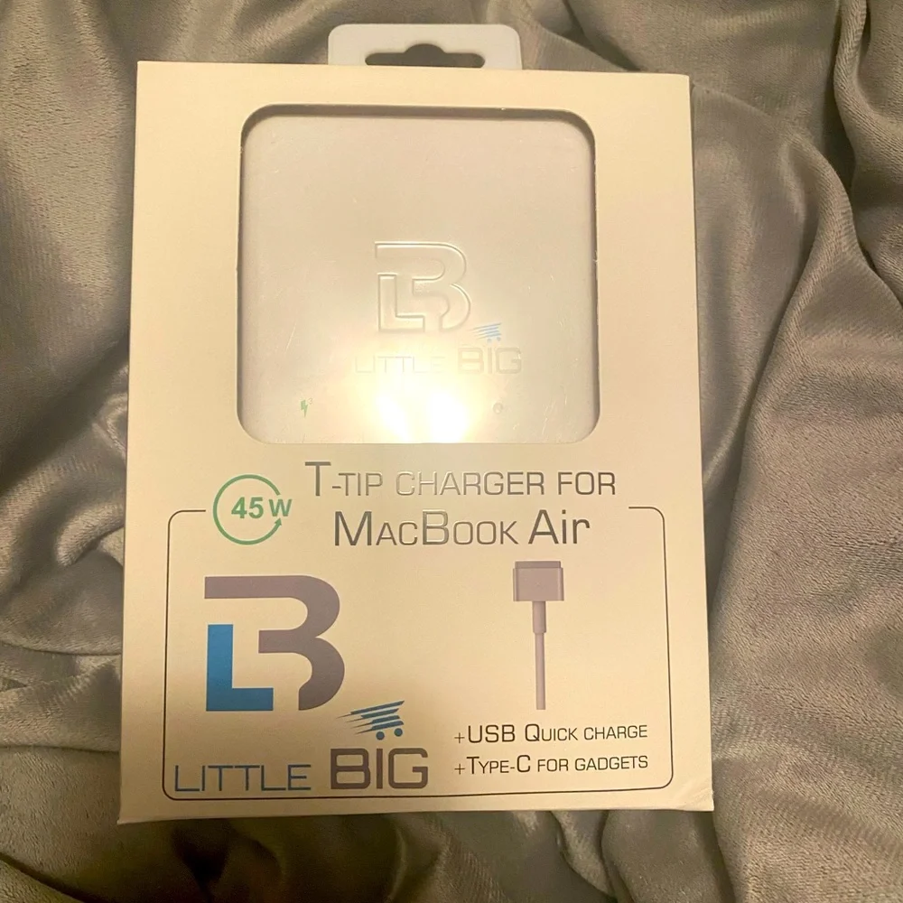 MacBook Air charger. 45w. Additional USB & Type-C charge for other gadgets.